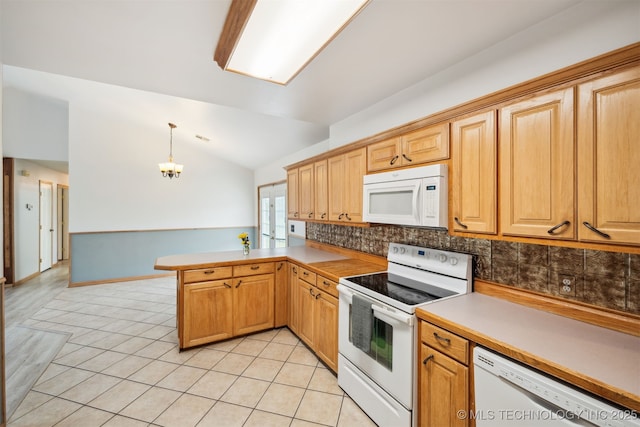 kitchen with backsplash, a peninsula, lofted ceiling, light tile patterned floors, and white appliances