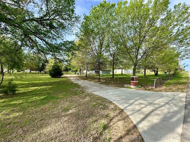 surrounding community featuring a lawn