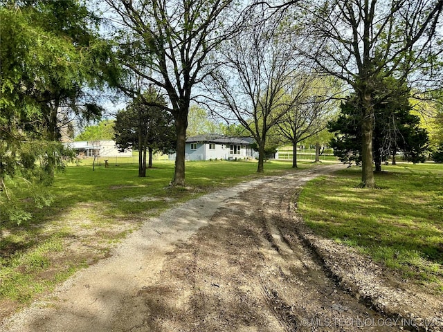 view of road featuring driveway