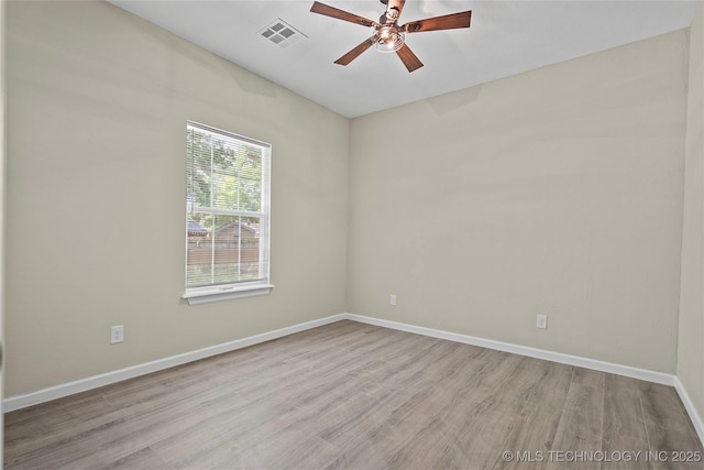 809 H NW, Ardmore, OK 73401 - unfurnished room featuring a ceiling fan and wood finished floors