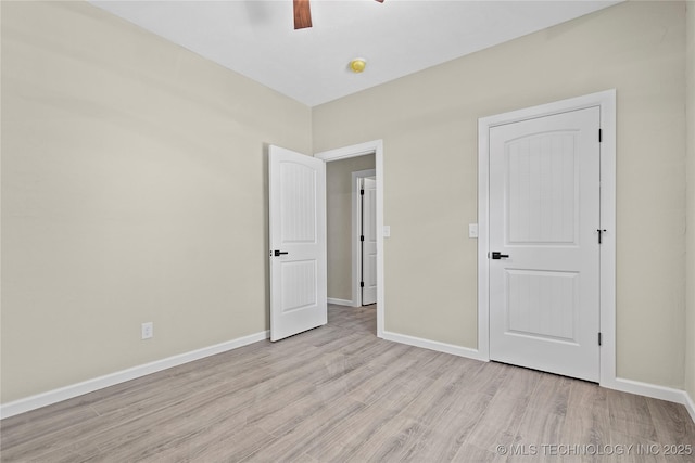 809 H NW, Ardmore, OK 73401 - unfurnished bedroom with light wood-style flooring and a ceiling fan