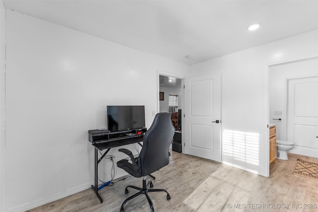 900 S Johnston, Ada, OK 74820 - office space with light wood-style flooring and baseboards