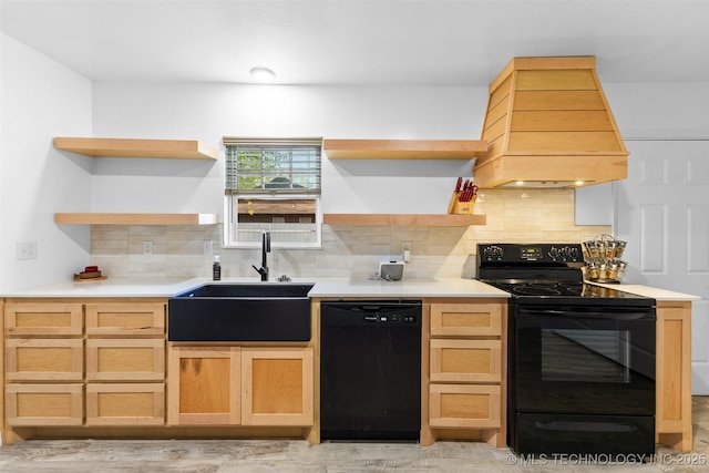 900 S Johnston, Ada, OK 74820 - kitchen with black appliances, open shelves, a sink, and tasteful backsplash