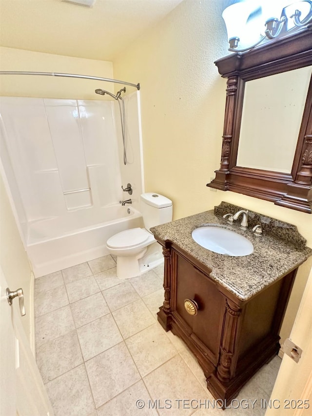 full bath featuring tile patterned flooring, vanity, toilet, and tub / shower combination