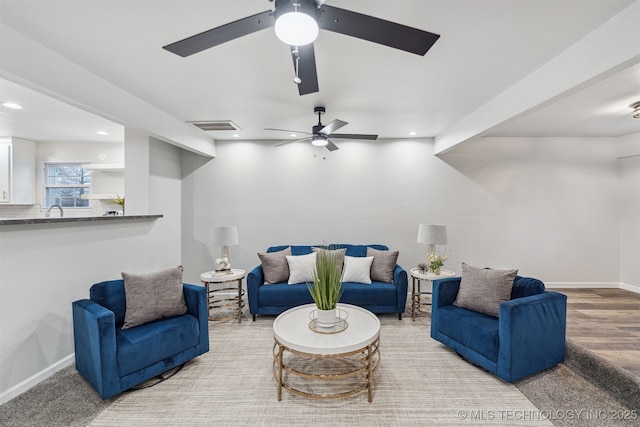 18446 E 112th St, Owasso, OK 74055 - living area with ceiling fan, baseboards, visible vents, and recessed lighting