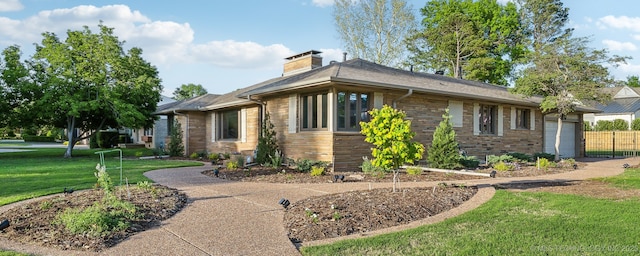 2947 S Peoria Ave, Tulsa, OK 74114 - view of side of property featuring a garage, a yard, brick siding, and a chimney