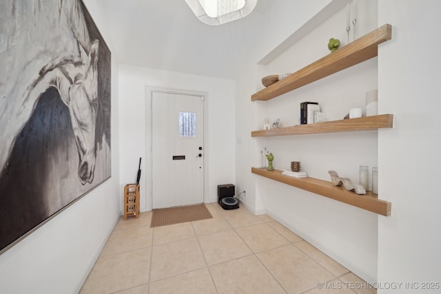 2947 S Peoria Ave, Tulsa, OK 74114 - foyer entrance featuring baseboards and light tile patterned flooring