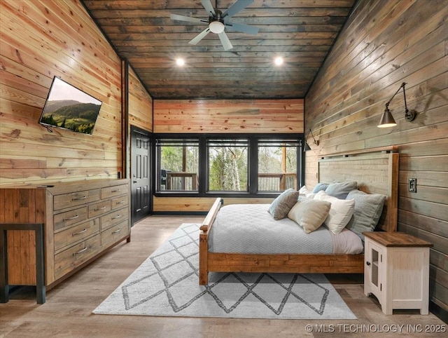 1739 NW 136th Rd, Wilburton, OK 74578 - bedroom featuring high vaulted ceiling, wood walls, light wood-style floors, and wood ceiling