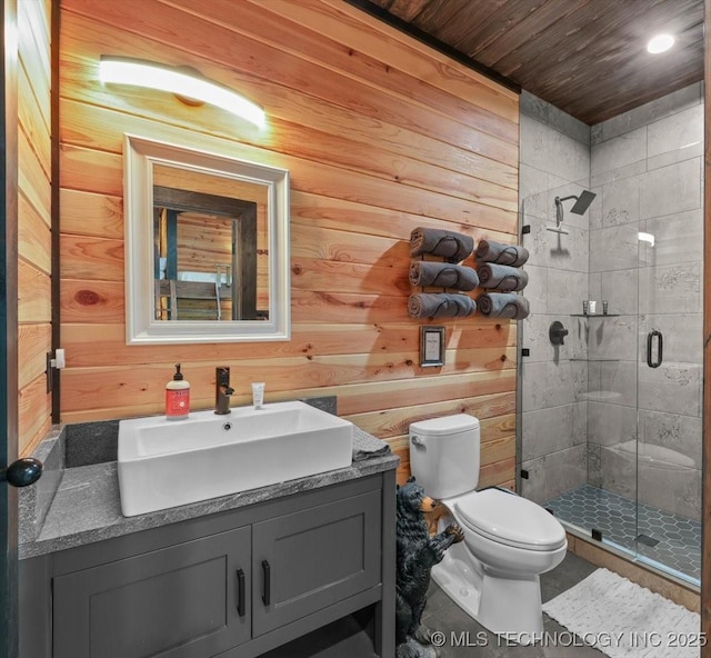 1739 NW 136th Rd, Wilburton, OK 74578 - full bath featuring wood walls, a stall shower, toilet, and vanity