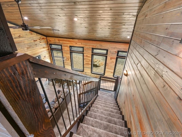 1739 NW 136th Rd, Wilburton, OK 74578 - staircase with wooden walls, wooden ceiling, ceiling fan, and recessed lighting
