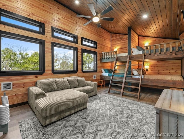 1739 NW 136th Rd, Wilburton, OK 74578 - interior space featuring wooden ceiling, visible vents, wooden walls, and plenty of natural light