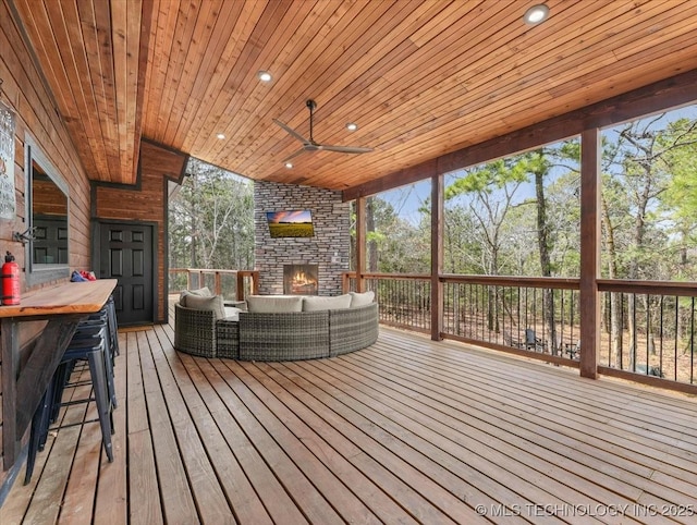 1739 NW 136th Rd, Wilburton, OK 74578 - wooden terrace with an outdoor hangout area and ceiling fan