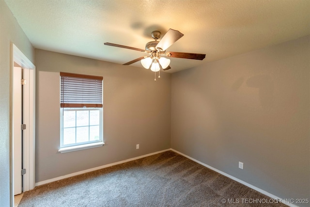 464888 E 1010th Rd, Sallisaw, OK 74955 - carpeted spare room featuring a textured ceiling, ceiling fan, and baseboards