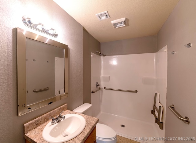 464888 E 1010th Rd, Sallisaw, OK 74955 - full bathroom with visible vents, toilet, a shower, a textured ceiling, and vanity