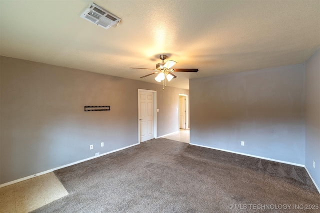 464888 E 1010th Rd, Sallisaw, OK 74955 - spare room featuring visible vents, ceiling fan, baseboards, and a textured ceiling