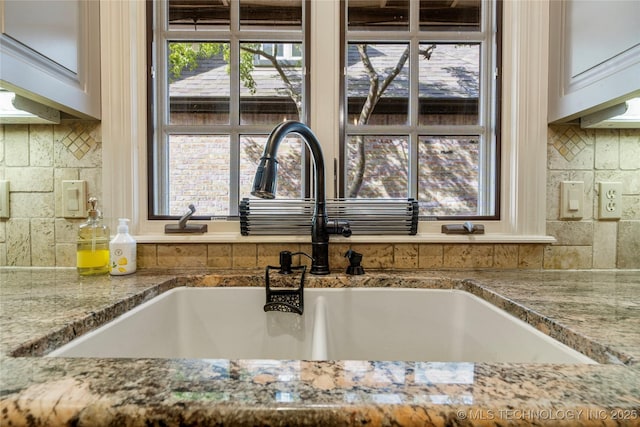 6323 E 111th Pl, Tulsa, OK 74137 - kitchen view of tasteful backsplash and light stone counters