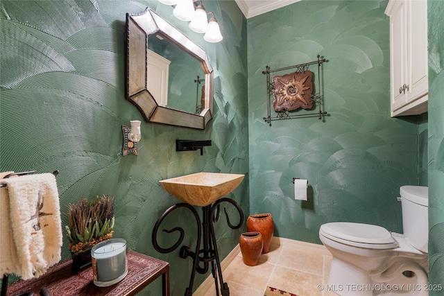 6323 E 111th Pl, Tulsa, OK 74137 - half bathroom with ornamental molding, wallpapered walls, and tile patterned flooring