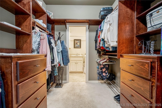 6323 E 111th Pl, Tulsa, OK 74137 - walk in closet featuring light carpet