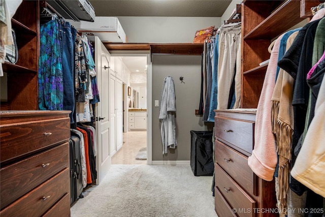 6323 E 111th Pl, Tulsa, OK 74137 - spacious closet featuring light carpet