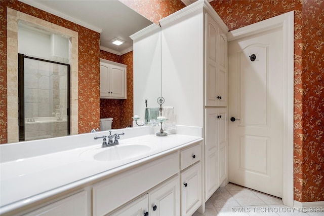 6323 E 111th Pl, Tulsa, OK 74137 - bathroom featuring wallpapered walls, vanity, ornamental molding, a shower stall, and tile patterned flooring