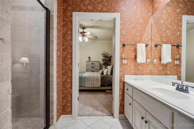 6323 E 111th Pl, Tulsa, OK 74137 - full bathroom with a shower stall, a ceiling fan, vanity, ensuite bath, and wallpapered walls