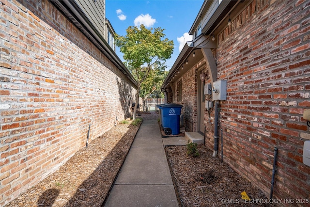 6323 E 111th Pl, Tulsa, OK 74137 - view of side of home featuring brick siding