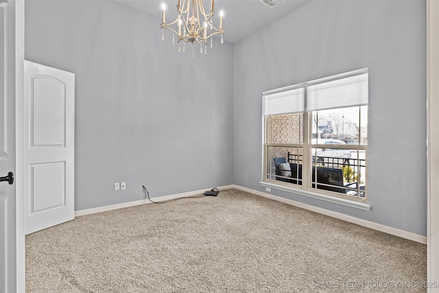 3316 W Jackson St, Broken Arrow, OK 74012 - empty room featuring a chandelier, baseboards, and carpet