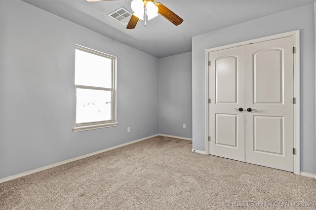 3316 W Jackson St, Broken Arrow, OK 74012 - unfurnished bedroom featuring light colored carpet, a closet, and a ceiling fan