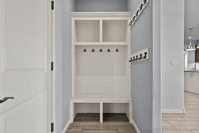 3316 W Jackson St, Broken Arrow, OK 74012 - mudroom with wood finished floors and baseboards