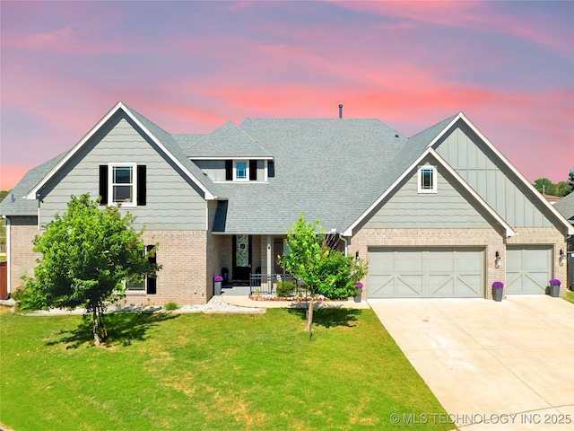 3316 W Jackson St, Broken Arrow, OK 74012 - view of front facade featuring covered porch, driveway, brick siding, and a yard