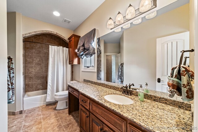 9931 N Chadford Rd, Owasso, OK 74055 - bathroom featuring vanity, shower / bath combo, and tile patterned floors