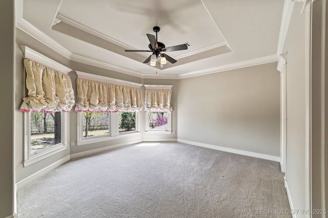 9931 N Chadford Rd, Owasso, OK 74055 - empty room featuring crown molding, carpet, a tray ceiling, and ceiling fan