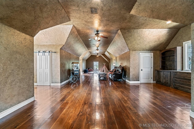 9931 N Chadford Rd, Owasso, OK 74055 - additional living space featuring a ceiling fan, lofted ceiling, and wood-type flooring