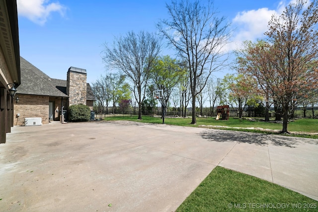 9931 N Chadford Rd, Owasso, OK 74055 - view of patio / terrace featuring community basketball court