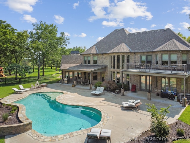 9931 N Chadford Rd, Owasso, OK 74055 - outdoor pool with a patio and a fenced backyard