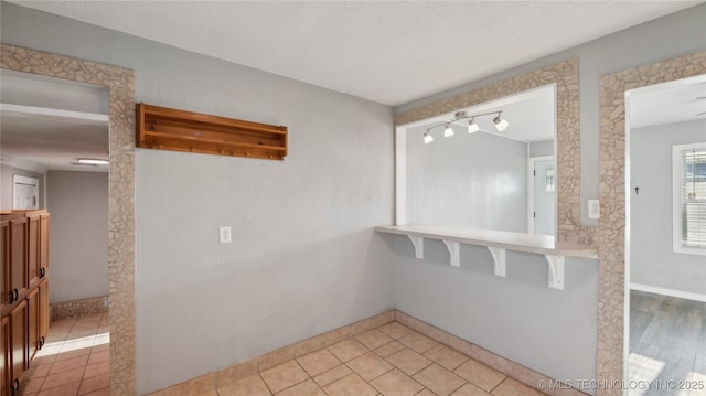 345 N Pine, Dewey, OK 74029 - empty room featuring baseboards