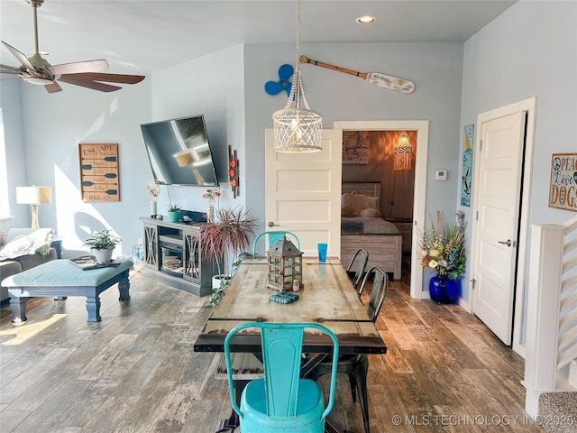dining room with lofted ceiling, ceiling fan, wood finished floors, and recessed lighting