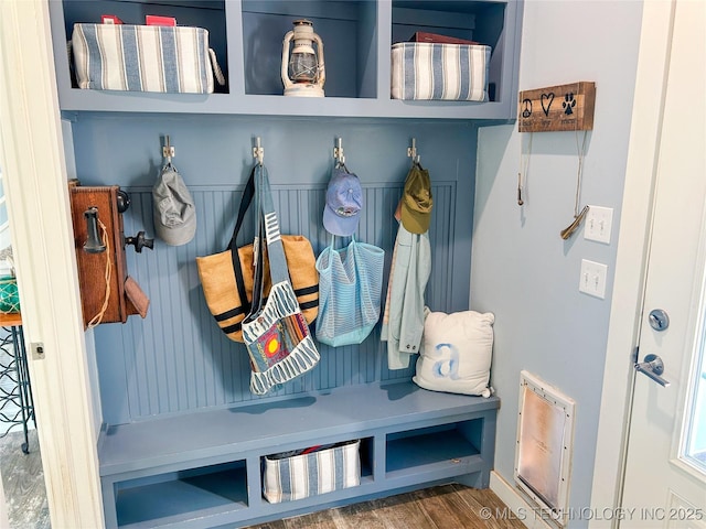 mudroom with wood finished floors