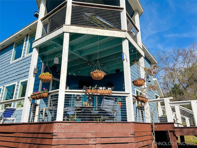view of home's exterior featuring a balcony
