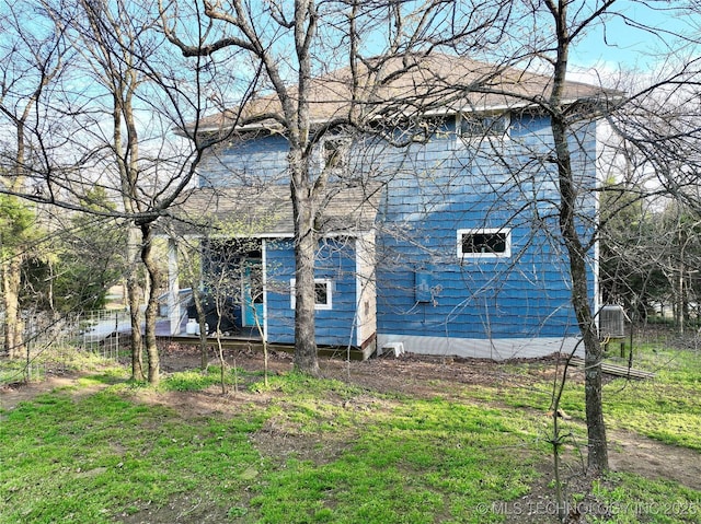 view of home's exterior with central AC unit