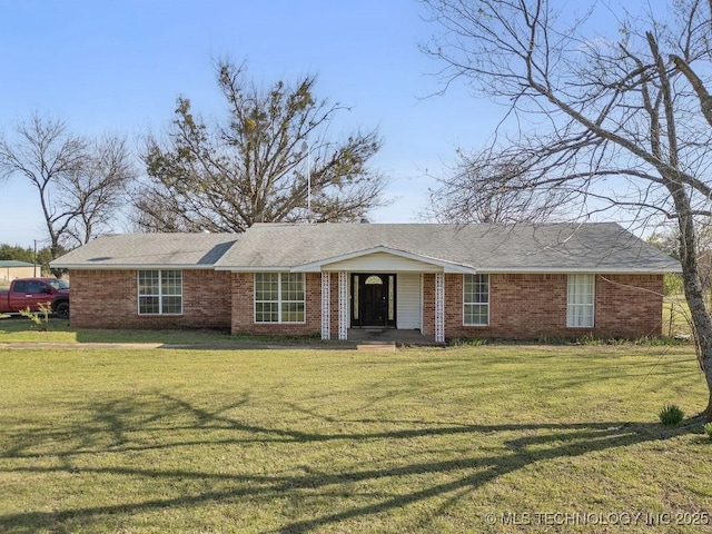 511 Tandy Walker, Silo, OK 74701 - ranch-style home with a front yard and brick siding