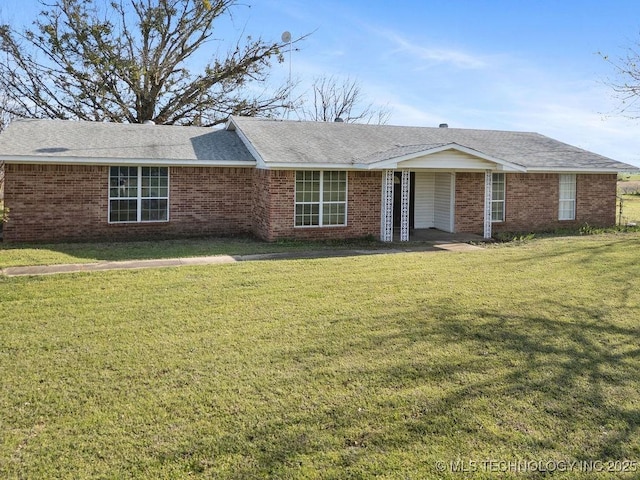 511 Tandy Walker, Silo, OK 74701 - ranch-style house with a front yard and brick siding