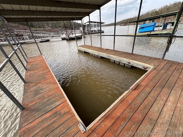 view of dock with a water view