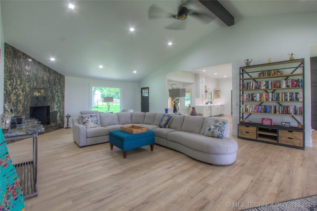 living room with beamed ceiling, wood finished floors, ceiling fan, and recessed lighting