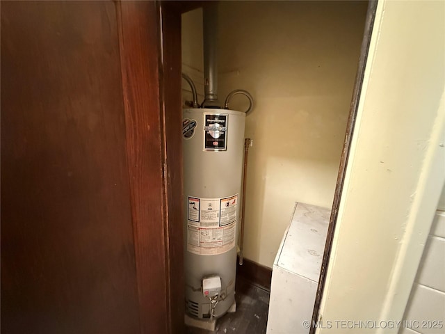 609 N E St, Mcalester, OK 74501 - utility room with water heater