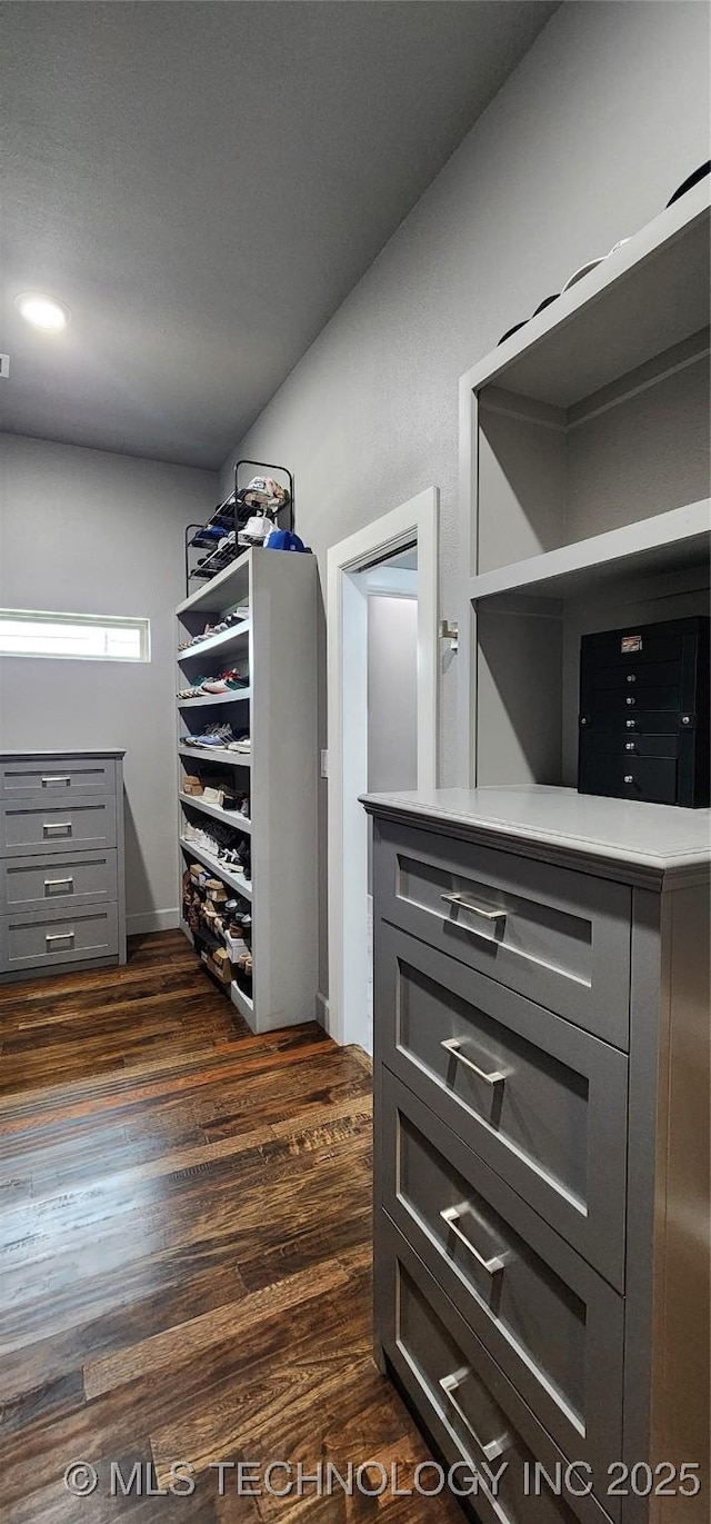 17078 S 11th W Ave, Glenpool, OK 74033 - walk in closet featuring dark wood finished floors