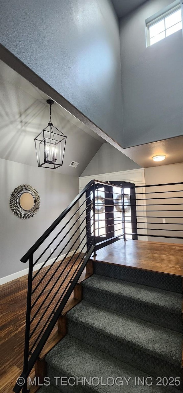 17078 S 11th W Ave, Glenpool, OK 74033 - staircase with a chandelier and wood finished floors