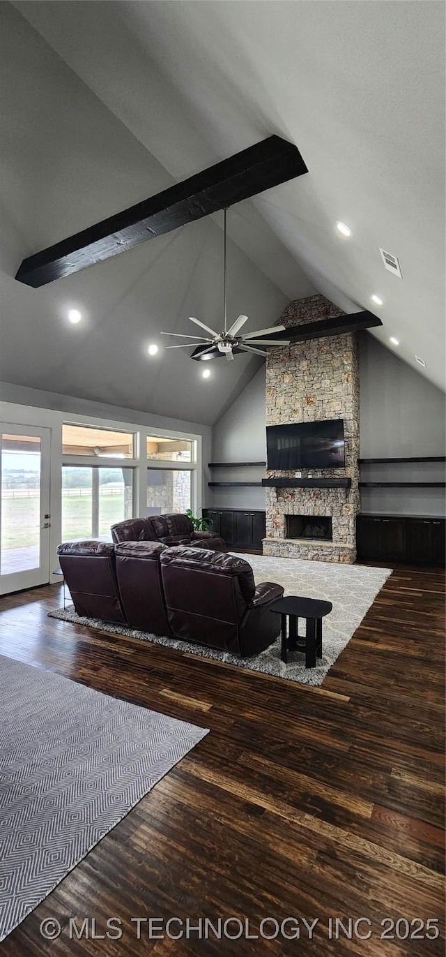 17078 S 11th W Ave, Glenpool, OK 74033 - living room with lofted ceiling, a ceiling fan, a stone fireplace, wood finished floors, and recessed lighting