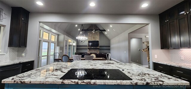 17078 S 11th W Ave, Glenpool, OK 74033 - kitchen with black appliances, backsplash, lofted ceiling, a large island with sink, and open floor plan