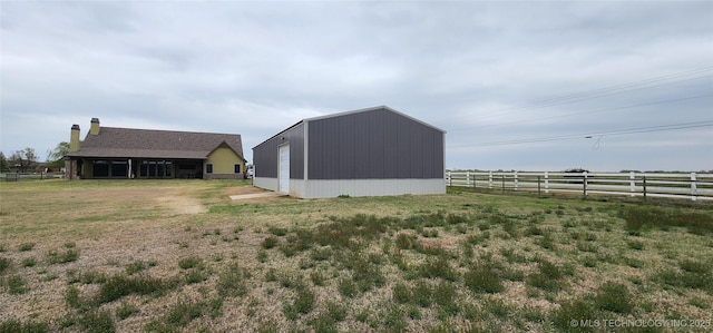 17078 S 11th W Ave, Glenpool, OK 74033 - view of yard featuring an outdoor structure and a detached garage